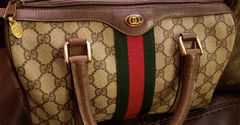 how do i know if gucci bag is real|gucci purse real.